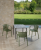 krzesło outdoor, nowoczesne krzesło, meble ogrodowe, odporność na warunki, perforowane oparcie, podłokietniki, ergonomia, komfort, styl industrialny, sztaplowanie, ogródek restauracyjny, balkon, trwałość, design