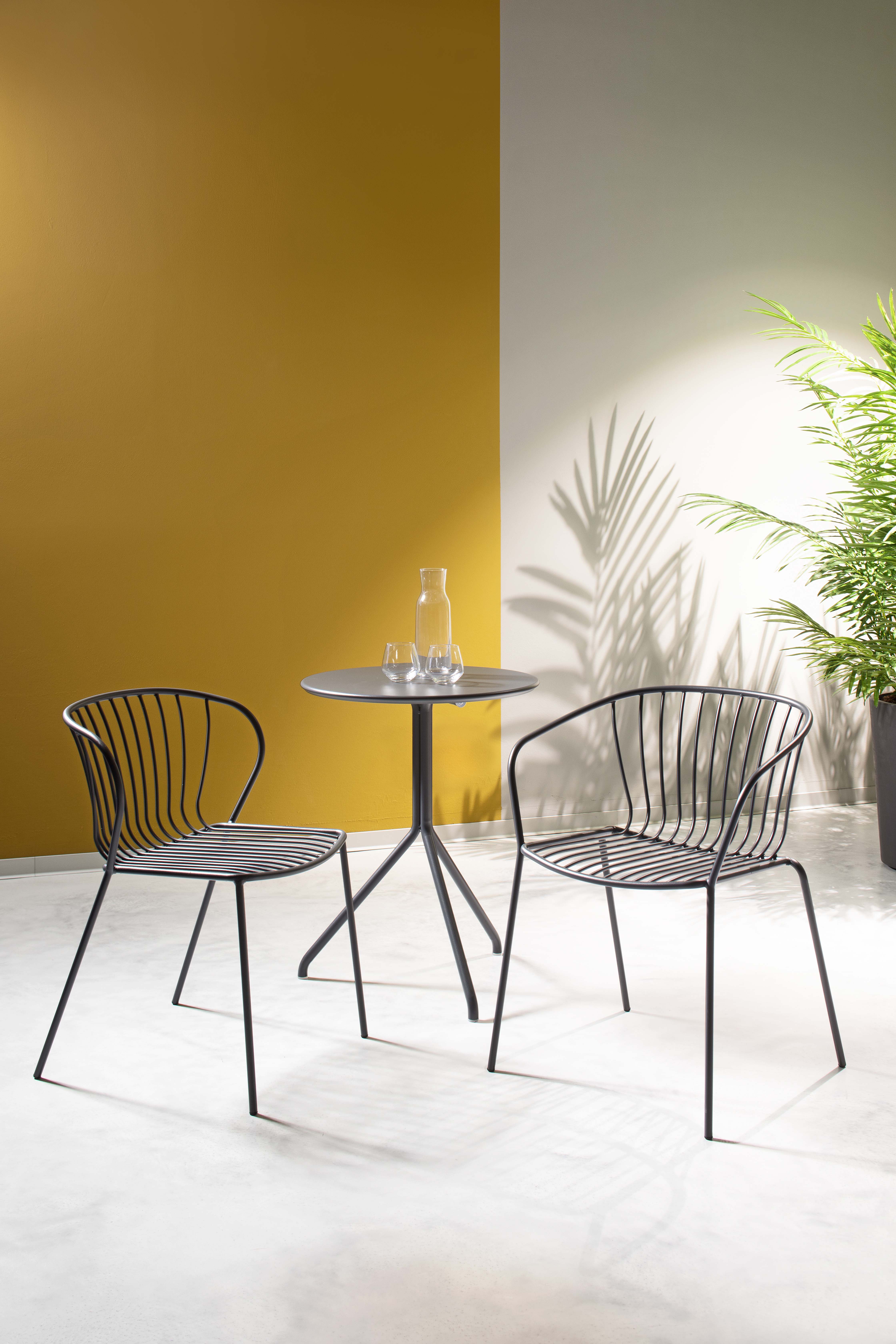 krzesło Amitha, styl industrialny, krzesło outdoor, krzesło do restauracji, minimalizm, trwałość, odporność na warunki, nowoczesny design, pręty stalowe, loft, meble komercyjne